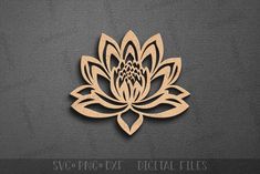 a wooden cutout of a lotus flower on a gray background with the words svc - png dxf digital files