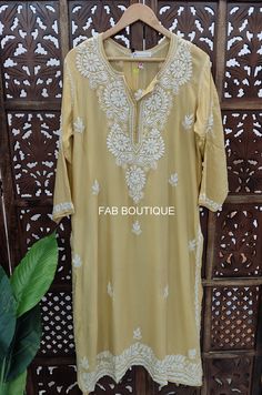 ▪ Kurti Fabric: Modal ▪ Kurti Length: 44-46 Inches ▪ Sleeves: 3/4 Sleeves ▪ Style: Straight Kurti ▪ Occasions: Party Wear, Office Wear, Festive Wear ▪ Garment Care: Hand Wash Only ▪ Price Includes: 1x Kurti Bohemian Cutdana Salwar Kameez For Eid, Bohemian Straight Kurta With Cutdana, Bohemian Kurta With Cutdana For Festive Occasions, Festival Straight Kurta Set With Resham Embroidery, Festival Sets With Resham Embroidery On Straight Kurta, Bohemian Georgette Kurta With Zari Work, Bohemian Yellow Kurta With Zari Work, Bohemian Cutdana Salwar Kameez For Festivals, Summer Kurta With Cutdana In Traditional Drape