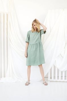 Linen Midi Dress, Cottagecore Dress, Linen ClothingThis is so comfortable! Handmade from 100% European linen, this is not only fashionable, but it’s also very high quality. Wear this to any event, and feel great while you are wearing it!D E S C R I P T I O N• A-line silhouette• Relaxed, loose fit• Elegant boat neckline• Dolman style sleeves• 3/4sleeves• Side seam pockets• The knee-lengthD E T A I L S• Name: PORTO• Sizes: XS - XXL• 100% European soft and washed linen fabric (weight 206 g/m² | 6.4 Dress Sage Green, Midi Dress With Pockets, Sage Green Dress, Dress Sage, Wrap Front Dress, Petite Dress, Dress Cottagecore, Linen Clothing, Cottagecore Dress