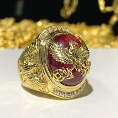 Vintage 15K 610 Gold Ruby Cabochon & White Topaz Eagle Men's Ring...Marked 610 and tested 15K Gold...Total of weights 14.9grams... Size 9Measure of Face 24.6MM...It's in very good condition. Luxury Men's Ruby Ring, Mens Ruby Ring Gold, Mens Gold Diamond Rings, Mens Ruby Ring, King Shoes, Ruby Ring Gold, White Opal Ring, Mens Ring Sizes, Green Opal