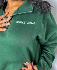 Introducing our new Curly Gang Unisex Quarter Zip-Up sweaters. This design is embroidered and it is soft and thick, guaranteed to keep you warm this season. Just like our other crewnecks, the quarter zip-ups feature the relaxed fit you love. DETAILS: Candicia is wearing a size: Medium This crewneck is made with Tri-Tech. The first layer is pill-resistant, 100% cotton. The second layer is shrink-resistant, 100% heavy-duty polyester. Finally, the inner layer is a cotton poly blend that provides so Zip Up Sweaters, Vibrant Clothing, Curl Types, Zip Up Hoodies, Zip Up Sweater, Off Black, Shirt Accessories, Mulberry Silk