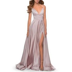 La Femme 28607 Deep V Neck High Slit Satin Gown Mauve Women's Size 10 Liquid Shimmer Pours Down This Satin Ballgown Cut With No Small Measure Of Daring Via A Plunging Neckline, An Open Back And An Unexpected Front Slit. Hidden Back-Zip Closure Plunge Neck Sleeveless V-Back Full-Length Ball Skirt With Front Thigh-High Slit Lined 100% Polyester Spot Clean Imported Dress, Mididress, Classic, Party, Elegant, Brunch, Date Designer, One Shoulder, Summer, Spring, Fall. Solid, Modern, Womens. B20523 Elegant Brunch, Satin Ballgown, Ball Skirt, Classic Party, Brunch Date, Satin Gown, Plunging Neckline, Thigh High, Deep V Neck