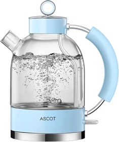 a glass tea kettle with water in it