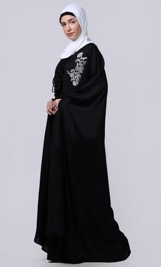 Essence Abaya is the simple, comfortable, easy and reliable breathable abayaA Proper Dress Is A Very Important Part Of Salah/Namaz. It Not Only Covers Us In A Proper Manner But It Also Relieves Us Of Consciousness Of Not Exposing The Awrah. The abaya Is Traditionally Worn Over Your Clothes For any occasion, Reading Of Quran Or Additional Modesty When In Groups. This Article Is Made Of Cotton Fabric Which Is Very Soft, Breathable, Light Weight And Easy To Maintain. It Gives A Good Fall To The Gar Modest Black Kaftan For Eid, Black Abaya With Modesty Panel For Eid, Black Embroidered Floor-length Abaya, Modest Black Thobe For Eid, Black Long Abaya With Modesty Panel, Kaftan Style, Patch Work, Embroidered Patch, Embroidered Patches