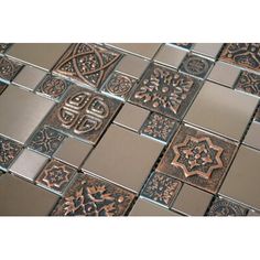 a close up view of some metal tiles