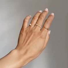 This minimalist cluster eternity ring is easy to wear everyday in any occasion and makes for gift. Set with beautiful cubic zirconia stones. Meant to be worn alone or stacked. - Made in gold vermeil: a thick 18k gold layer on 925 sterling silver.- Cubic zirconia gemstones- Band thickness: 3 mm. If you are in between sizes, we recommend sizing up. Ring Size Chart Everyday Stackable Open Diamond Ring, Gold Minimalist Stackable Eternity Band, Minimalist Diamond Eternity Band For Everyday, Minimalist Half Eternity Band For Everyday, Diamond Minimalist Everyday Eternity Band, Timeless Everyday Stackable Cubic Zirconia Rings, Everyday Timeless Stackable Rings In Cubic Zirconia, Everyday Timeless Stackable Cubic Zirconia Rings, Minimalist Everyday Diamond Eternity Band