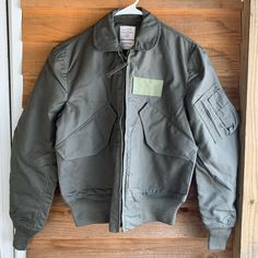 Nomex Military Flight Jacket Mens Size Small 34-36 Army Green Color Deep Front Velcro Pockets, Fire Resistant Full Zipper Excellent Condition- Never Worn, New But Tag Came Off. This Is New And Has Never Been Worn Please See Pictures For Chest( Armpit To Armpit) And Length ( Collar To Bottom) All Sales Final Fitted Khaki Outerwear For Outdoor, Retro Outerwear With Patch Pockets For Outdoor, Fitted Utility Outerwear With Flap Pockets, Khaki Fitted Utility Jacket For Outdoor, Fitted Khaki Utility Jacket For Outdoor, Retro Khaki Outerwear For Outdoor, Fitted Military Outerwear With Pockets, Fitted Khaki Outerwear With Multiple Pockets, Retro Outerwear With Patch Pockets For Winter