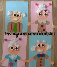 three paper dolls made to look like old people with big eyes and white hair on them