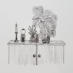 a black and white drawing of some plants on a table with a candle next to it