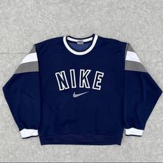 Amazing Condition Vintage Piece Bought For Myself But Was Too Small This Fits Like A Medium Imo Tag Marked Large Blue Embroidered Tops For Streetwear, Sporty Blue Embroidered Sweatshirt, Vintage Nike Clothes, Blue Sweatshirt Outfit, Inspo Fits, Vintage Nike Sweatshirt, Academia Outfits, Navy Blue Sweatshirt, Nike Retro