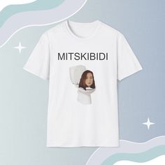 a white t - shirt with an image of a woman's face on it