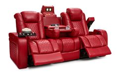 a red leather reclining chair with two seats and a table in front of it