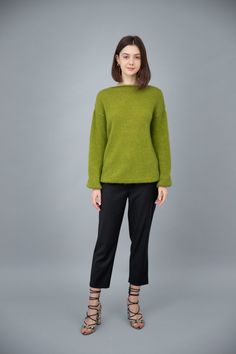 This gorgeous, sophisticated piece made from the highest quality Italian silk mohair blend.  It has slightly balloon sleeves, dropped shoulders and a cropped but little bit oversized fit.  This luxurious yarn is an exclusive mix of 75% mohair super kid and 25% mulberry silk.   This sweater is both warm, light and soft. One size S/M- suitable for sizes: XS, S, M. Regular in size. The model is 175 cm and wears size S/M. Details 75% kid mohair, 25% mulberry silk Dropped shoulder Boat neckline Long sleeve with elastic band Soft, light & warm yarn Hand Wash, max 30oC / Dry Flat Oversized Knitted Sweater, Pull Mohair, Perfect Coat, Sweater Oversized, Pink Coat, High Quality Dress, Mohair Sweater, Knitting Women Sweater, Pullover Sweater Women