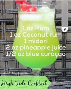 a green drink in a glass with a red cherry on top and the words high tide cocktail