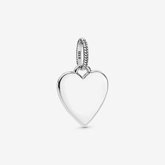 Show them the shape of your heart with the enduring symbol of love. This pendant can be engraved with your own special message. Crafted from sterling silver, our heart pendant is perfect for giving a voice to how you feel. This Pandora piece is all about self-expression: choose to keep it blank and let the symbol speak for itself or engrave the front, the back or both. Pandora Engraving is only available in select stores and markets. - Pandora Engravable Heart Tag Pendant - Sterling silver Pearl Diamond Jewelry, Stackable Birthstone Rings, Heart Tag, Solid Gold Necklace, Solid Gold Earrings, Gold Armband, Gifts For Sister, Les Sentiments, Charm Rings