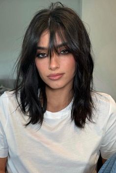 Here's how to style them, according to the experts. Dixie D'amelio Haircut, Shaggy Brunette Hair, 2025 Hair Trends For Women Long, Cute Shaggy Haircuts, Long Bangs With Short Hair, Mid Shag Haircut, Long Bob Styling, Shaggy Haircuts Straight Hair, Long Bobs Haircuts