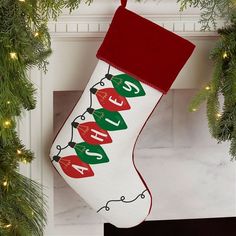 a christmas stocking hanging from a mantel