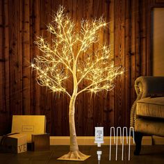 PRICES MAY VARY. 【HOME DECOR】: Totally 4FT high with full white lifelike twigs, this pre lit twig tree, create an elevated natural holiday scene 【EXQUISITE TEXTURE】: Hand crafted with vivid tree bark finish over the tree trunk and base gives it a natural woodland feel 【WIDELY USE】: All-weather design is made for outdoor yard, entryway porch decor. A special holiday display for Easter, Thanksgiving, Christmas fireplace, kitchen, living room, party decor 【DIY BRANCHES】: Flexible yet sturdy branche Lighted Trees Indoor, Pre Lit Twig Tree, Tree With Fairy Lights, Living Room Party Decor, Diy Branches, White Twig Tree, String Lights Inside, Fairy Lights In Trees, Joy Decorations