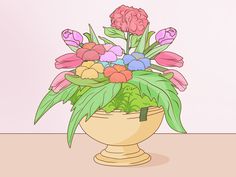 a vase filled with lots of flowers on top of a table