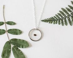 Forget me not Heather real pressed flower dainty minimalist | Etsy Minimalist Everyday Jewelry With Natural Inclusions, Minimalist Jewelry With Natural Inclusions For Everyday, Minimalist Pendant Necklace With Natural Inclusions, Dainty Circular Charm Necklace As Gift, Minimalist Open Circle Charm Necklace As Gift, Dainty Round Charm Necklaces With Pressed Flowers, Minimalist Round Jewelry With Pressed Flowers, Minimalist Sterling Silver Jewelry With Pressed Flowers, Minimalist Round Pendant Healing Jewelry