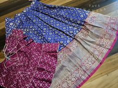 Product Description: The Benarasi Silk Lehenga Blouse is a stunning traditional Indian outfit that is perfect for young girls aged 11 to 12 years old. This set includes a lehenga (long skirt) and a blouse, both made from high-quality Benarasi silk fabric. The lehenga features intricate handwoven designs and is adorned with delicate zari work, giving it a luxurious and elegant look. The blouse is also beautifully crafted with matching zari work and has a comfortable fit. This Lehenga set is perfe Sets With Self Design For Navratri, Designer Blue Lehenga With Traditional Patterns, Eid Long Skirt With Zari Work, Traditional Lehenga With Traditional Patterns, Eid Traditional Wear With Zari Work, Designer Lehenga With Traditional Patterns For Eid, Designer Wear Lehenga For Eid With Traditional Patterns, Designer Eid Lehenga With Traditional Patterns, Eid Lehenga With Traditional Patterns For Designer Wear