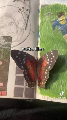 a butterfly is sitting on top of a book with the words butterflies in front of it