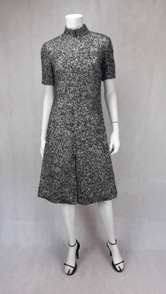 1960's Diorling by Christian Dior wool A-line wool dress  *Long zip on the back < 58cm - 22.83inch *Fully lined in black Viscose (?) Sold at the Harrods  department store in London, the Diorling line was Christian Dior's Maison vision for the younger women... In good vintage condition.  Some very small holes in lining.  No size label attached  Please follow below measurements for a correct fit Measurements taken flat: *Collar high < 4.5cm - 1.77inch *Shoulders < 11.5cm - 4.53inch *Shoulder to Sh Fitted A-line Tweed Dress For Evening, Classic Wool A-line Dress, Black Wool Evening Dress, Black Wool Dress For Evening, Classic A-line Wool Dress, Formal Knee-length Wool Tweed Dress, Formal Knee-length Wool Dress, Formal Wool A-line Dress, Fitted Wool A-line Dresses