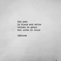 a black and white photo with the words she sees in black and white thinks in greys but loves in color