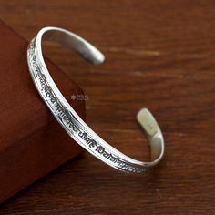 This bangle is beautifully designed like vintage antique traditional jewellery of india, made by 925 sterling silver, we can easily adjust size, excellent gifting tribal jewelry from india. Metal-925 sterling silver. Item Type-Cuff Kada bracelet. Weight-16.420 grams Size-2-8or 2.5" (easy to adjust) Width-0.7 centimetres. Stamped-925. Finish-Oxidized. Makes excellent gifting for birthdays, wedding, anniversary, Christmas day, valentines day. mother's day. Sterling Silver Bracelet Jewelry For Rituals, Engraved Bangle For Rituals, Spiritual Sterling Silver Bracelet For Weddings, Spiritual Silver Cuff Bracelet For Festivals, Sterling Silver Bangle Bracelets For Rituals, Sterling Silver Stamped Jewelry For Ceremonial Occasion, Adjustable Sterling Silver Bangle For Festivals, Adjustable Sterling Silver Cuff Bracelet For Festivals, Traditional Stamped 925 Silver Bangle