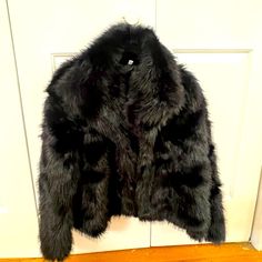 Purchased In Switzerland Boutique Black Faux Fur Coat For Cold Weather, Black Faux Fur Coat For Winter, Black Faux Fur Coat For Fall, Black Faux Fur Coat With Long Sleeves, Black Long Sleeve Faux Fur Coat, Chic Black Fur Coat With Faux Fur Trim, Black Outerwear With Faux Fur Trim For Fall, Black Faux Fur Outerwear For Cold Weather, Chic Black Outerwear With Faux Fur Lining