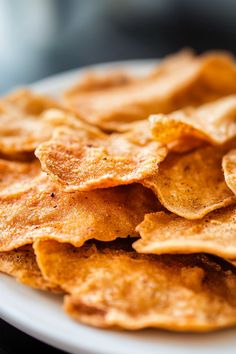 a white plate topped with tortilla chips