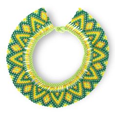 a green, yellow and white beaded necklace on a white background with an oval hole in the middle