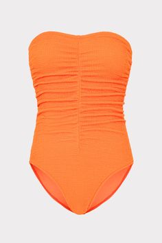 If bandeau is your go-to silhouette, don’t miss this absolutely perfect one-piece. It’s ruched throughout to create an elongating and more forgiving look. And it’s cut from our unique, sustainable textured swim fabric.For other similar pieces to the neon orange Textured Ruched One Piece, check out Milly's curated swimwear collection. Spring Textured Swimwear For Pool, Solid Color Ruched Bandeau Swimwear, Solid Ruched Bandeau Swimwear, Ruched Polyamide Swimwear For Beach, Strapless Ruched Nylon Swimwear, Orange Texture, Maxi Dress Cocktail, Cocktail Evening Dresses, Ruched Bodice