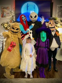 a group of people dressed up in halloween costumes