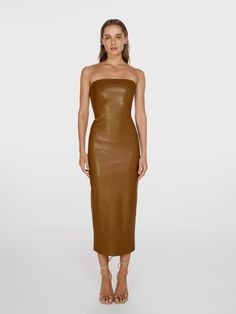 Full shot of a girl in a brown vegan leather tube dress Midi Dress Brown, Miranda Priestly, Leather Midi Dress, Slouchy Pants, Slow Fashion Brands, Leather Design, Slow Fashion, Strapless Dress Formal, Fashion Brand