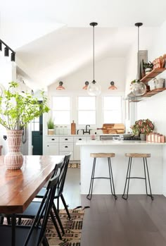 the kitchen is clean and ready to be used as a dining room or living area