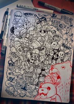 a notebook with some drawings on it