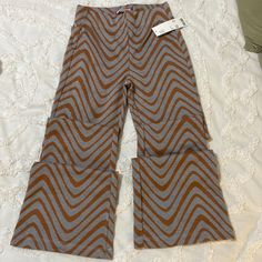 Too Long On Me And Just Know I Won’t Get Them Hemmed. Sooo Cute! Urban Outfitters Pants, Ribbed Flares, Printed Flare Pants, Flare Legging, Lace Pants, Urban Outfitters Women, Knit Boots, Stretchy Pants, Kick Flares