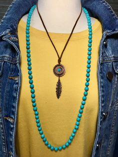 Copper and turquoise concho leather necklace with feather MADE IN USA Blue Bohemian Concho Necklace, Bohemian Blue Concho Necklace, Adjustable Turquoise Concho Necklaces, Adjustable Turquoise Concho Necklace, Turquoise Concho Bohemian Necklace, Adjustable Turquoise Necklace With Concho, Turquoise Bohemian Concho Necklace, Adjustable Turquoise Jewelry With Feathers, Copper And Turquoise