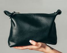 "I have created this pouch based on my needs when I travel, but I'm sure you will find it very useful as well. It is a toiletry bag, but there's nothing to stop you use it as a purse, while at work or while on holiday. It's a beautiful bag! I used a soft leather, pleased at touch, and the interior is lined with a easy to clean fabric. This is it! 23 cm (L) x 16 cm (H) x 6 cm (D) 9\" x 6.3'' x 2.36\"" Leatherworking Ideas, Leather Makeup Pouch, Camel Leather Bag, 2018 Style, Leather Dopp Kit, Black Life, Leather Cosmetic Bag, Tech Bag, Leather Makeup Bag