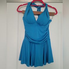 Says Medium But Runs Small. Ruched Stomach, Cups In The Bust, Halter Tie, And Skirt Design For Modesty. Never Worn But Missing The Plastic Fitted Blue Swim Skirt For Spring, Blue Ruched Swim Skirt For Beachwear, Blue Stretch Swim Skirt For Spring, Blue Ruched Swim Skirt For Summer, Blue Ruched Fitted Swim Skirt, Fitted Blue Ruched Swim Skirt, Fitted Ruched Blue Swim Skirt, Fitted Blue Ruched Swimwear, Blue Fitted Ruched Swimwear