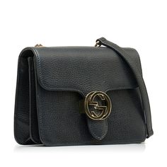 The combination of texture and softness gives this Bag a touch of practical elegance. The finely grained black calfskin is complemented by pale gold-tone hardware. The interior features three compartments, slip pockets and a zippered pocket. The Bag can be  on the shoulder or crossbody. Gucci Leather Bag With Turn-lock Closure, Gucci Crossbody Bag With Turn-lock Closure, Luxury Gucci Bags With Turn-lock Closure, Gucci Travel Bag With Turn-lock Closure, Gucci Black Bag With Gold-tone Hardware, Pale Gold, Vuitton Bag, Diaper Backpack, Baby Bag