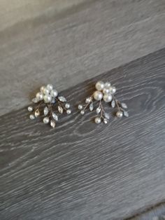 Pearl and Rhinestone shoe clips. Comes in a pair. Stylish and elegant for brides, bridesmaid and mother of the bride. Rhinestone colors: opal and clear Pearl color is Ivory White Rhinestone Bridal Earrings For Formal Occasions, White Crystal Embellished Bridal Earrings For Wedding, Formal White Rhinestone Bridal Earrings, Formal White Bridal Earrings With Rhinestones, White Rhinestone Earrings For Wedding, White Rhinestone Wedding Earrings, White Crystal Embellished Wedding Earrings, White Crystal Bridal Accessories For Formal Occasions, Formal White Crystal Bridal Accessories