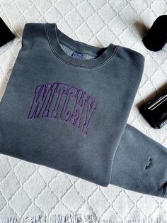 Witchy Sweatshirt Embroidered Crewneck *witch sweatshirt, witch crewneck, witch sweater, witchy clothing, witchy crewneck, witchy sweatshirt, pagan sweatshirt, witch embroidered sweatshirt, halloween sweatshirt embroidered, halloween crewneck embroidered, embroidered halloween sweatshirt, embroidered halloween crewneck, subtle halloween, retro halloween, salem, halloween cookies, dancing skeletons, country halloween, cat ghosts, halloween boo sheet, spooky season sweatshirt, halloween embroidered, cowboy ghosts, spooky teacher, * ABOUT THIS SWEATSHIRT: This crewneck is the perfect solution for what to wear the next time you're feeling like you want a little bit of spooky Halloween vibes. It's cozy soft and has a unisex fit that can be styled any number of ways. Embroidered with special car Halloween Crewneck Sweatshirt, Black Embroidered Text Sweater For Fall, Embroidered Text Top For Fall Streetwear, Embroidered Text Tops For Fall Streetwear, Embroidered Text Top For Streetwear In Fall, Black Sweater With Embroidered Text For Fall, Casual Halloween Top With Embroidered Logo, Black Fall Sweater With Embroidered Text, Halloween Streetwear Embroidered Top