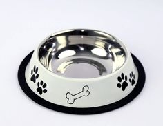 a dog bowl with a bone and paw prints on it