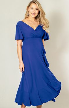 What's not to love about the fabulous Waterfall Midi Maternity Dress. Introducing a new colourway in striking cobalt blue, this flattering shade is known for its soothing and peaceful qualities, promoting stability and calm. The Waterfall design features ruffle details on the skirt and a gathered cross-over neckline. Perfect for casual or formal styling, this versatile maternity dress is wonderful for pregnancy, nursing and afterwards. Cobalt Blue shade in premium viscose jersey Faux wrap skirtR Blue V-neck Maternity Dress, Fitted Blue Maternity Dress With Ruffles, Elegant Blue V-neck Maternity Dress, Elegant Blue Maternity Dress With V-neck, Elegant Blue Maternity Dress For Summer, Rose Tiffany, Tiffany Rose, Pregnant Wedding, Waterfall Design