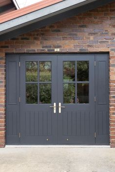 two double doors with sidelights on brick building