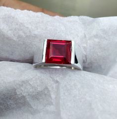 Certified  Handmade, Ruby Ring for men and women stone : Lab ruby colour : Red weight : 8.5 carat Panchdhatu handmade gold plated ring for astrological purpose Stone has natural inclusion is any material that is trapped inside a mineral during its formation. other reason Colour of the gemstone may vary owing to photography lighting Keywords:- natural ruby sterling silver ring size 10 sterling silver natural ruby ring natural ruby rings for women sterling silver natural ruby and silver ring celtic natural ruby silver rings for women sterling silver natural ruby womens size 12  natural ruby rings for women natural ruby ring for men natural ruby rings for women white gold natural ruby rings for women gold natural ruby ring for women antique natural ruby rings for women contemporary natural ru Ruby Band Ring, Red Ruby Ring, Cadeau Parents, Natural Ruby Ring, Ruby Rings, Pearl And Diamond Ring, Ring Birthstone, Ring Mens, Ruby Engagement Ring