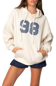 Make it your year in this soft slouchy hoodie designed in a baggy fit and framed by dropped shoulders. Drawstring hood Ribbed cuffs and hem Kangaroo pocket 50% cotton, 50% polyester Machine wash, dry flat Imported Wwe T Shirts, Flannel Sweatshirt, Hoodie Oversize, Girls Blouse, Oversized Hoodie, Sweaters And Jeans, Guess Jeans, Oversize Hoodie, Hoodie Design