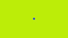 a blue dot is in the middle of a green background